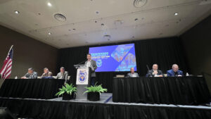 JC 7 President Peter Finn presides over the Delegates’ meeting on day one of the conference.